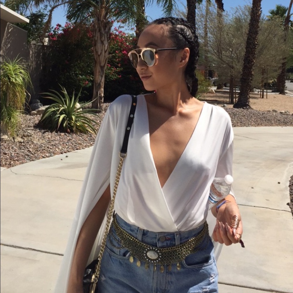 White long open sleeved bodysuit from @GiaMonae